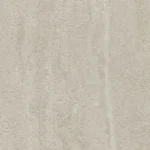 A textured beige surface with subtle vertical lines and variations in tone, resembling a natural stone or plaster finish. The context is not specified.